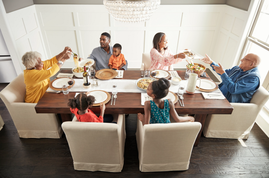Happy family enjoying break fast | Brian's Flooring & Design