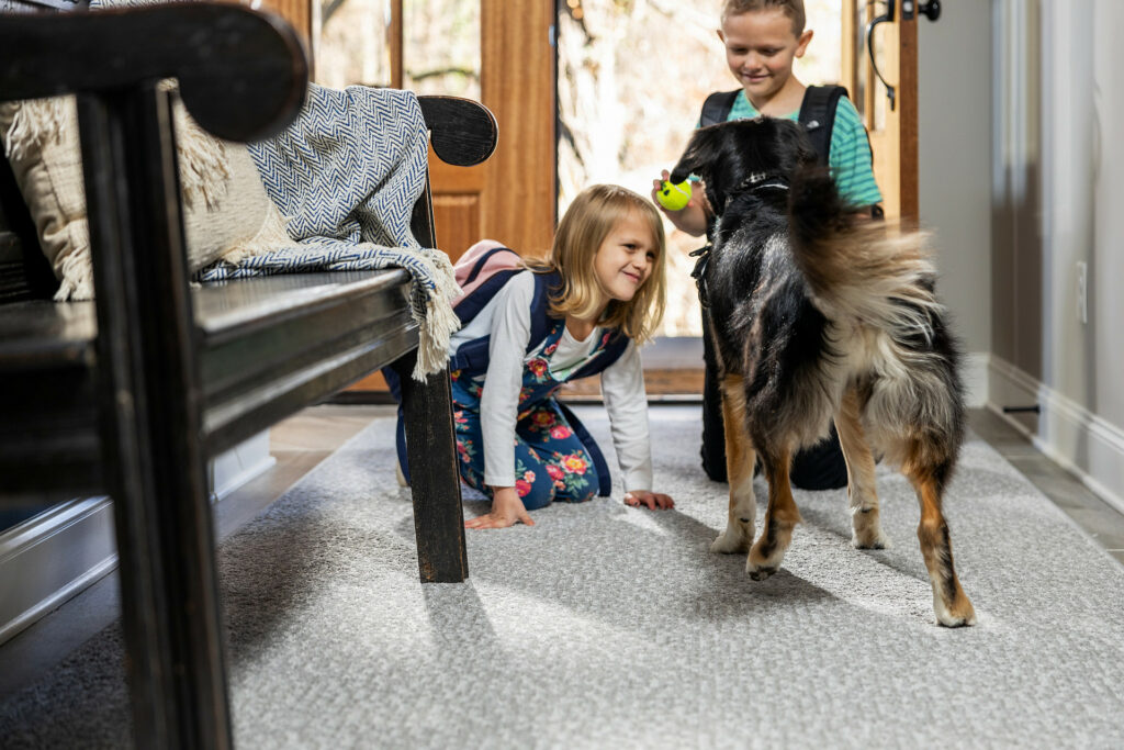Kids on carpet flooring with pet friendly | Brian's Flooring & Design