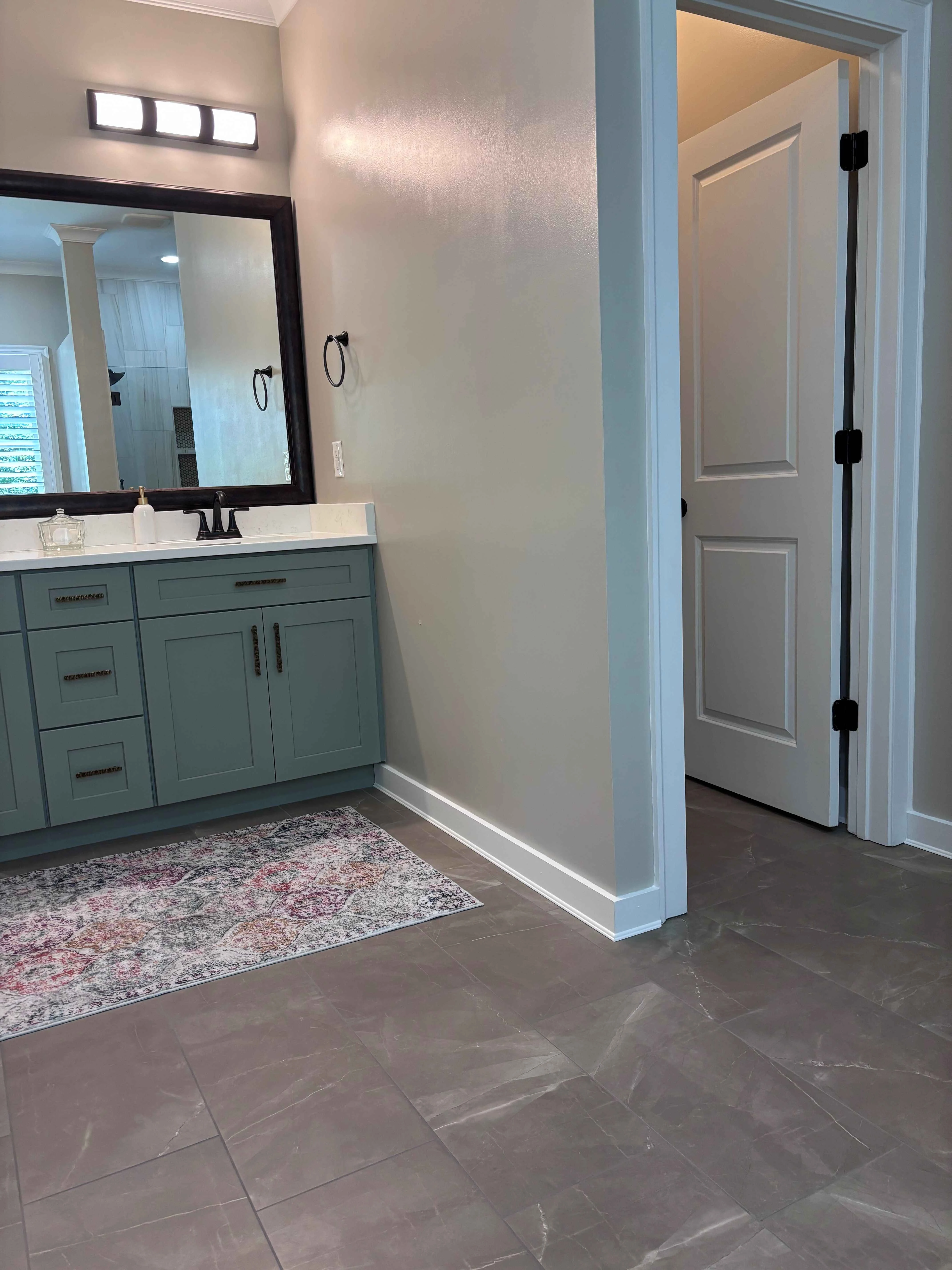holland bathroom floor with rug